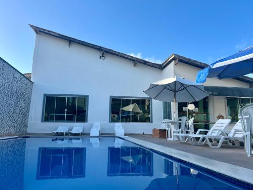 Bazén v ubytování Oasis Praia Hotel nebo v jeho okolí