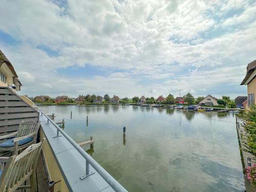 a view of a river from a boat at Aquamarijn in Stavoren