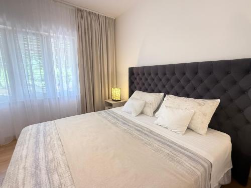 Postel nebo postele na pokoji v ubytování Green Park Apartments