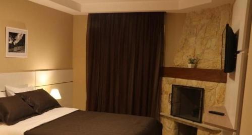 Postel nebo postele na pokoji v ubytování Hotel Willisau