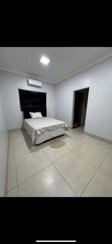 Postel nebo postele na pokoji v ubytování Casa Nova e Espaçosa em rio verde