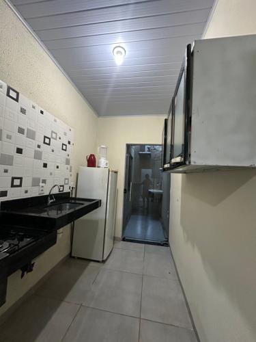 A cozinha ou kitchenette de Residencial Davisis - Parada do Jalapão