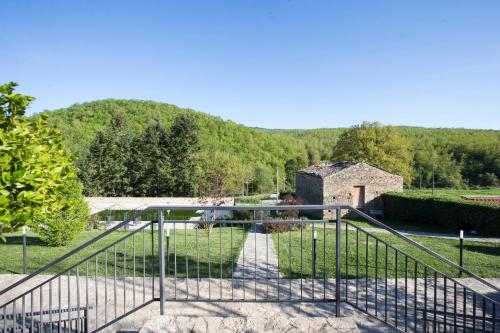 a gate with a view of a mountain at Sotto Il Cielo Hotel in Pignola