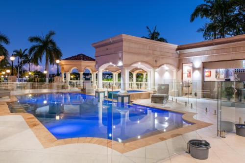 a swimming pool in the middle of a building at Bellagio Gold Coast in Gold Coast