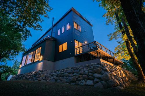 a house on top of a pile of rocks at SORA - Zao Sansuien Gaia Resort - Vacation STAY 54039v in To-katta