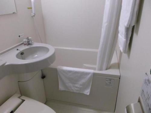 Ванная комната в Hotel Route Inn Hirosaki Ekimae