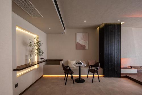 Posezení v ubytování Dali Shuanglang Haiyu Sea View B&B (Double Corridor shop)