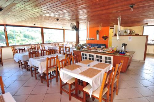 Restaurant o un lloc per menjar a Hotel da Canoa