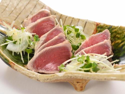 a plate of food with meat and salad on it at La'gent Inn Kesennuma in Higashi-hachimammae