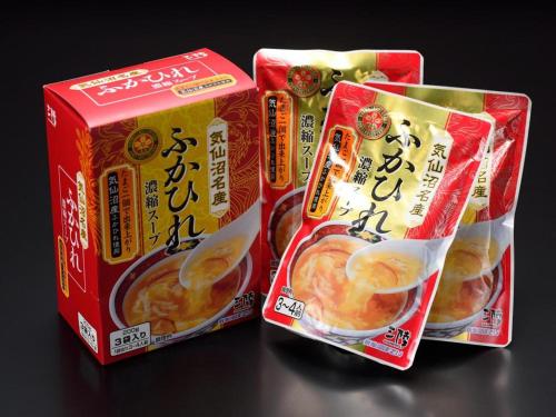 two bags of food sitting on top of a table at La'gent Inn Kesennuma in Higashi-hachimammae