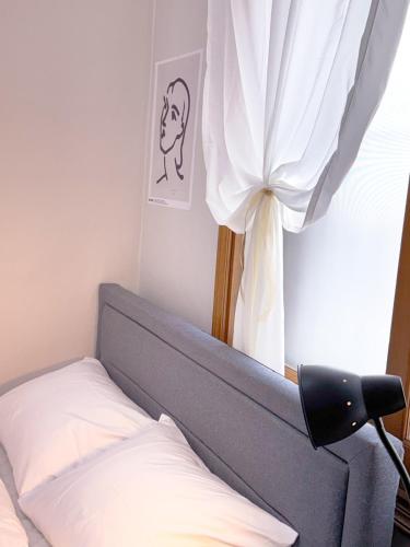 Ένα ή περισσότερα κρεβάτια σε δωμάτιο στο Stay On Daegu