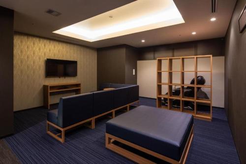 Телевизор и/или развлекательный центр в HOTEL BAYGULLS