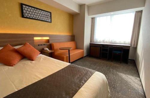 Кровать или кровати в номере HOTEL BAYGULLS
