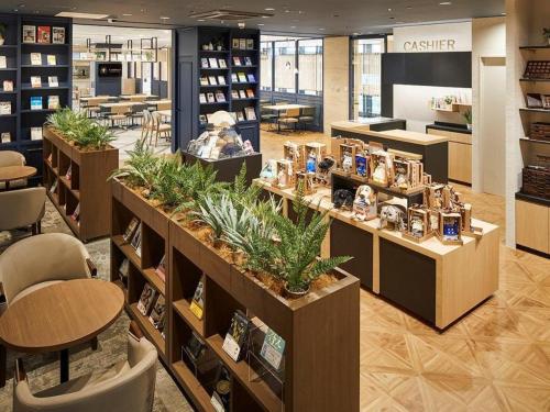 a library with plants on display in a store at KEIKYU EX INN Haneda Innovation City 2 minutes walk from HICity Exit of Tenkubashi Station in Tokyo