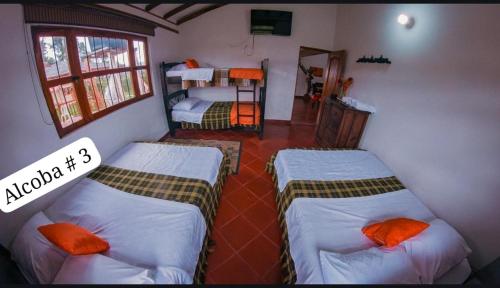 Postel nebo postele na pokoji v ubytování Cabaña Campestre Villa Clarita, Villa de Leyva