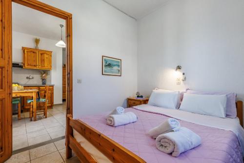 Nikolaos studios apartmentsにあるベッド