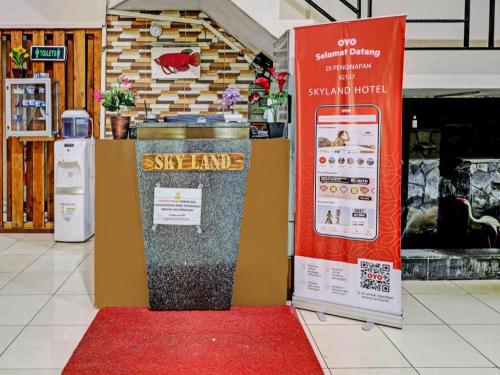 a supermarket with a smart stand and a red banner at OYO Life 92127 Skyland Pasteur in Bandung
