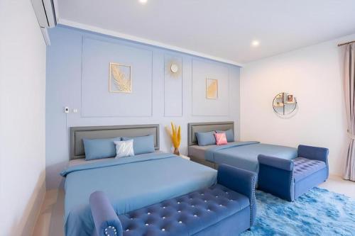 Ένα ή περισσότερα κρεβάτια σε δωμάτιο στο Platinum Pool Villa