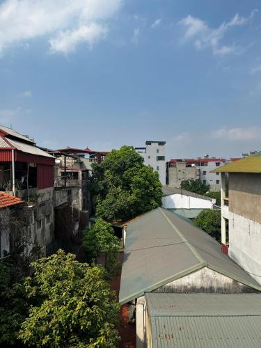 an overhead view of a city with buildings and trees at Hoe Stay - Where to stay in Hanoi