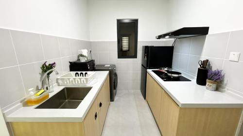 Кухня или мини-кухня в 168 Park Selayang by Manhattan Group
