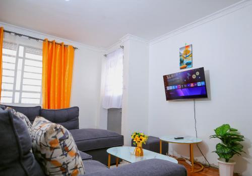 TV a/nebo společenská místnost v ubytování Blend-Inn Staycation 1 bedroom Thika town