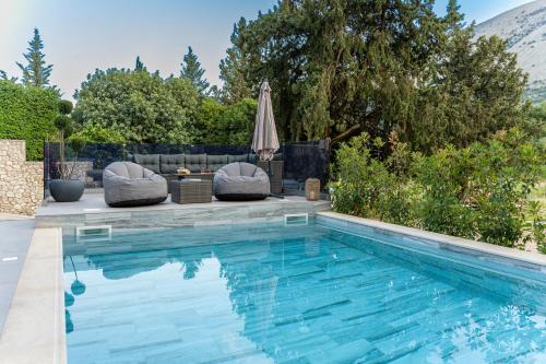 Бассейн в Luxury Villa Ora I или поблизости