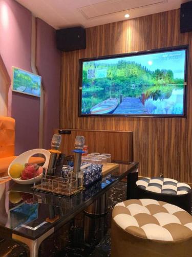 TV a/nebo společenská místnost v ubytování Xiamen SIG Resort
