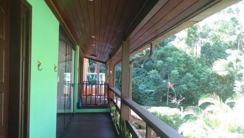 Κήπος έξω από το Quarto em casa na Mata Atlântica