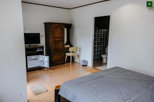 TV a/nebo společenská místnost v ubytování Pingview Villa Resort