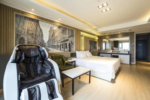 Ένα ή περισσότερα κρεβάτια σε δωμάτιο στο Pohang Hotel View
