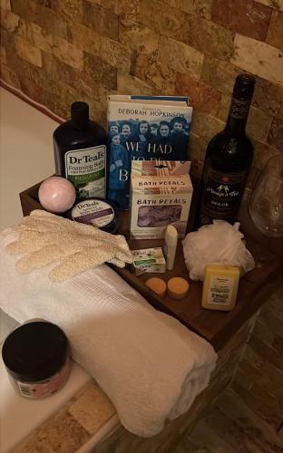 a shelf with a bunch of products on it at Priv Hidden retreat ATV trails spa fishing outdoor activities in Jefferson