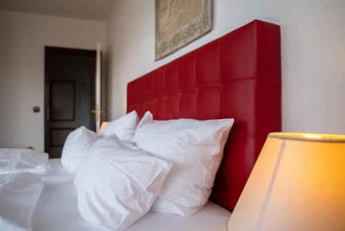 Ένα ή περισσότερα κρεβάτια σε δωμάτιο στο Hotel Appartement Landhaus Stutzi - Hotel Strandperle