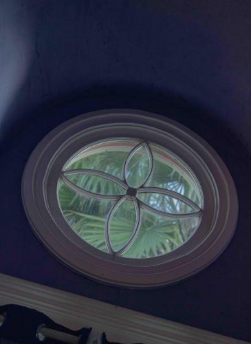a plate with a design on the top of a ceiling at Cabernet House, an Old World Inn in Napa
