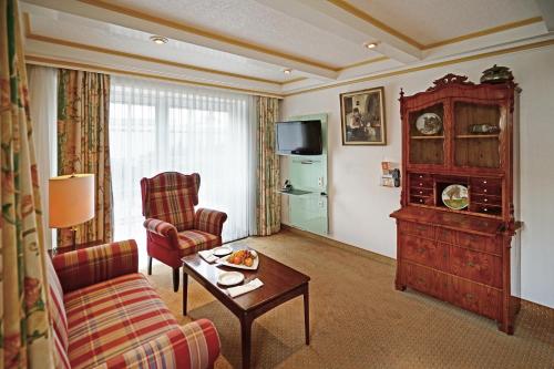 Μια τηλεόραση ή/και κέντρο ψυχαγωγίας στο Hotel Appartement Landhaus Stutzi - Hotel Strandperle
