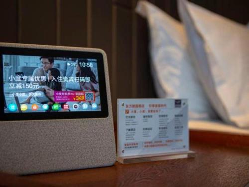 TV a/nebo společenská místnost v ubytování Jiyuan Oriental Jianguo Hotel