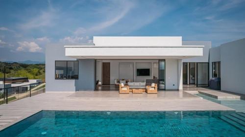 Φωτογραφία από το άλμπουμ του Casa Paradise in Encanto's Land σε Pereira