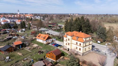 an aerial view of a house with an orange roof at Apartmány Na Seníku in Třeboň