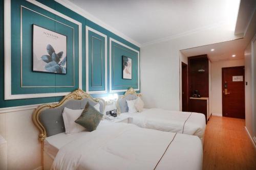 Кровать или кровати в номере Towns Well Motel