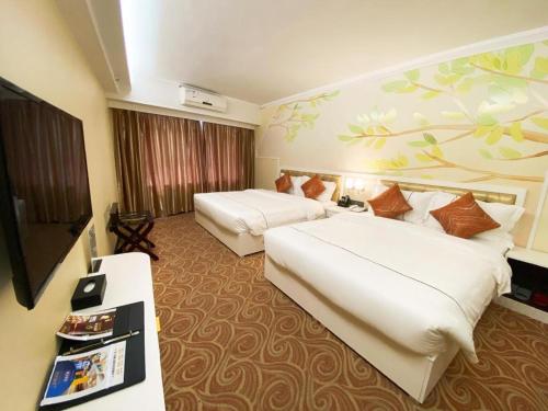 Кровать или кровати в номере Towns Well Motel