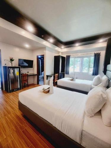 Katil atau katil-katil dalam bilik di Dream Hotel