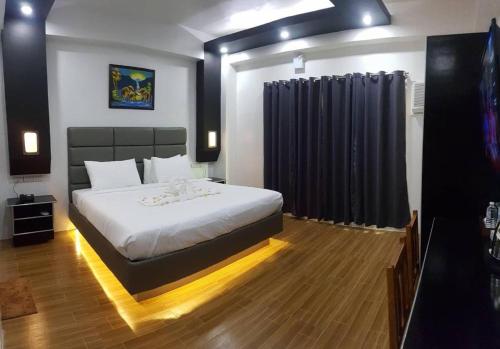 Katil atau katil-katil dalam bilik di Dream Hotel