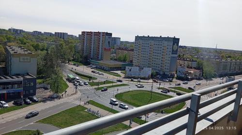 a view of a city with cars on a street at Apartment SANRiSe in Białystok