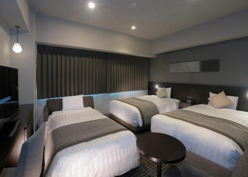 Katil atau katil-katil dalam bilik di Hiroshima Washington Hotel