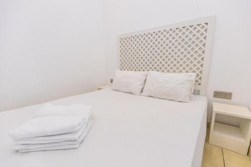 Ein Bett oder Betten in einem Zimmer der Unterkunft Greencliff Mirissa