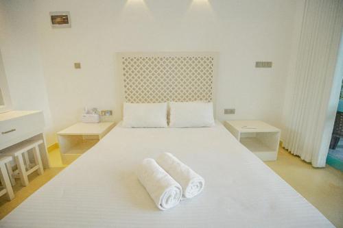 Ein Bett oder Betten in einem Zimmer der Unterkunft Greencliff Mirissa
