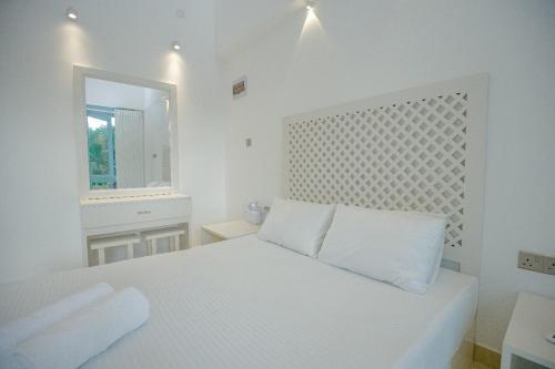Ein Bett oder Betten in einem Zimmer der Unterkunft Greencliff Mirissa