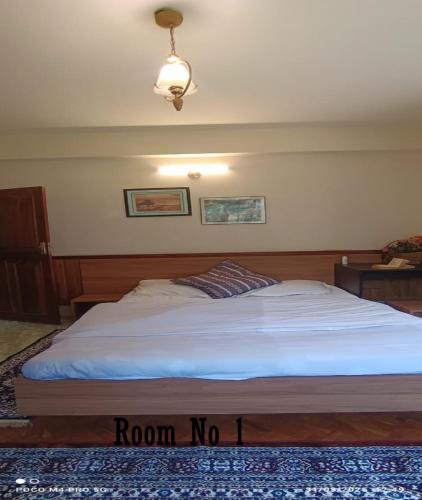 Cama o camas de una habitación en Ronglyang Villa Homestay Near MG Road