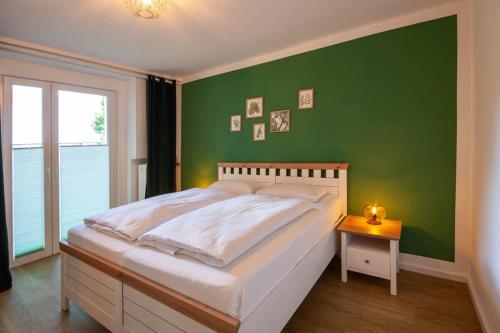 Postel nebo postele na pokoji v ubytování Ferienwohnung Am Bach 1 mit Terrasse