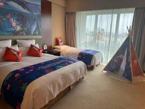 Cama o camas de una habitación en The Qube Shanghai Nanqiao