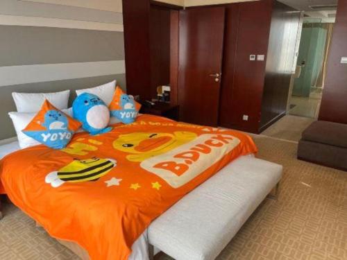 Cama o camas de una habitación en The Qube Shanghai Nanqiao